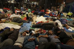 Syrian refugees having rest at the floor of Keleti railway station. Refugee crisis. Budapest  Hungary  Central Europe  5 September 2015