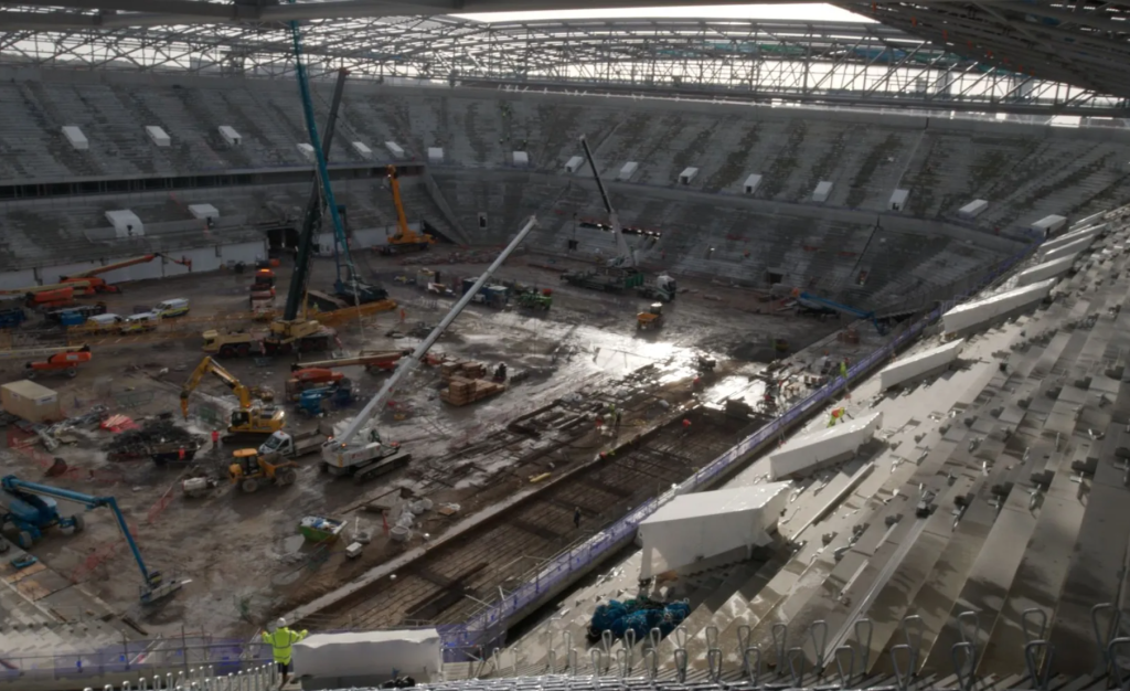 Everton Stadium Steeptiered south stand visible among key